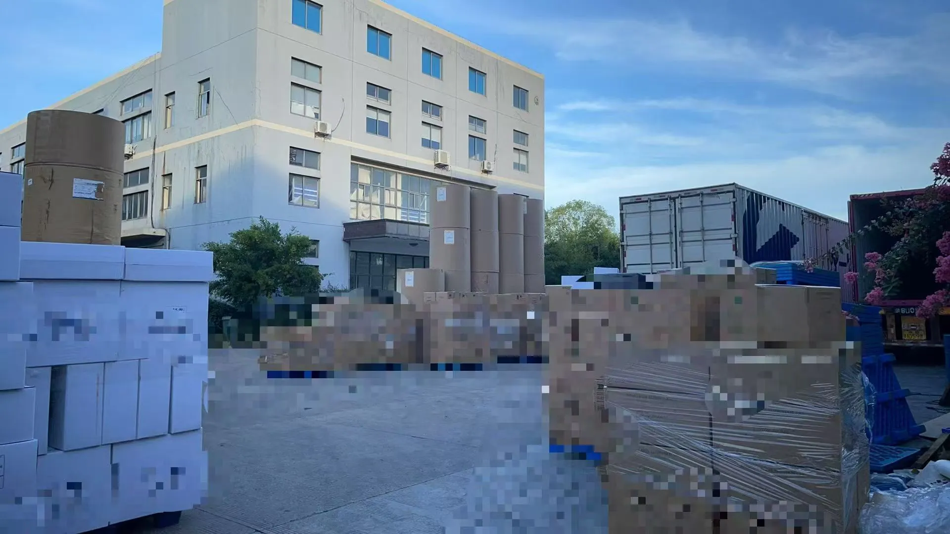 Food packaging factory loading yard with customer information redacted